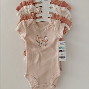 Brand new Carter’s new born bodysuit - Pink